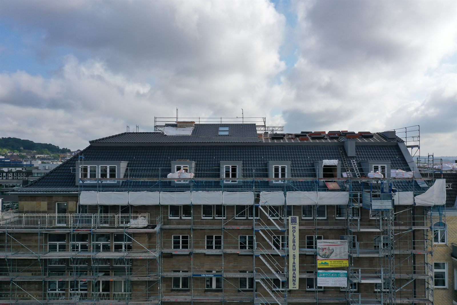Mansarddach-Sanierung an einem Mehrfamilienhaus – Schaaf & Dornhöfer Aachen